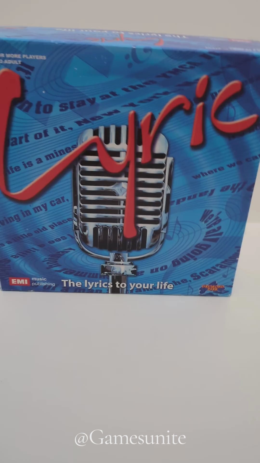 Complete Lyric (2007) game setup with quiz cards, timer, and musical elements ready for an interactive and fun game night.