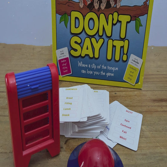 Don’t Say It (2008) game box featuring colourful graphics, word cards, and the game logo emphasizing fun word challenges.