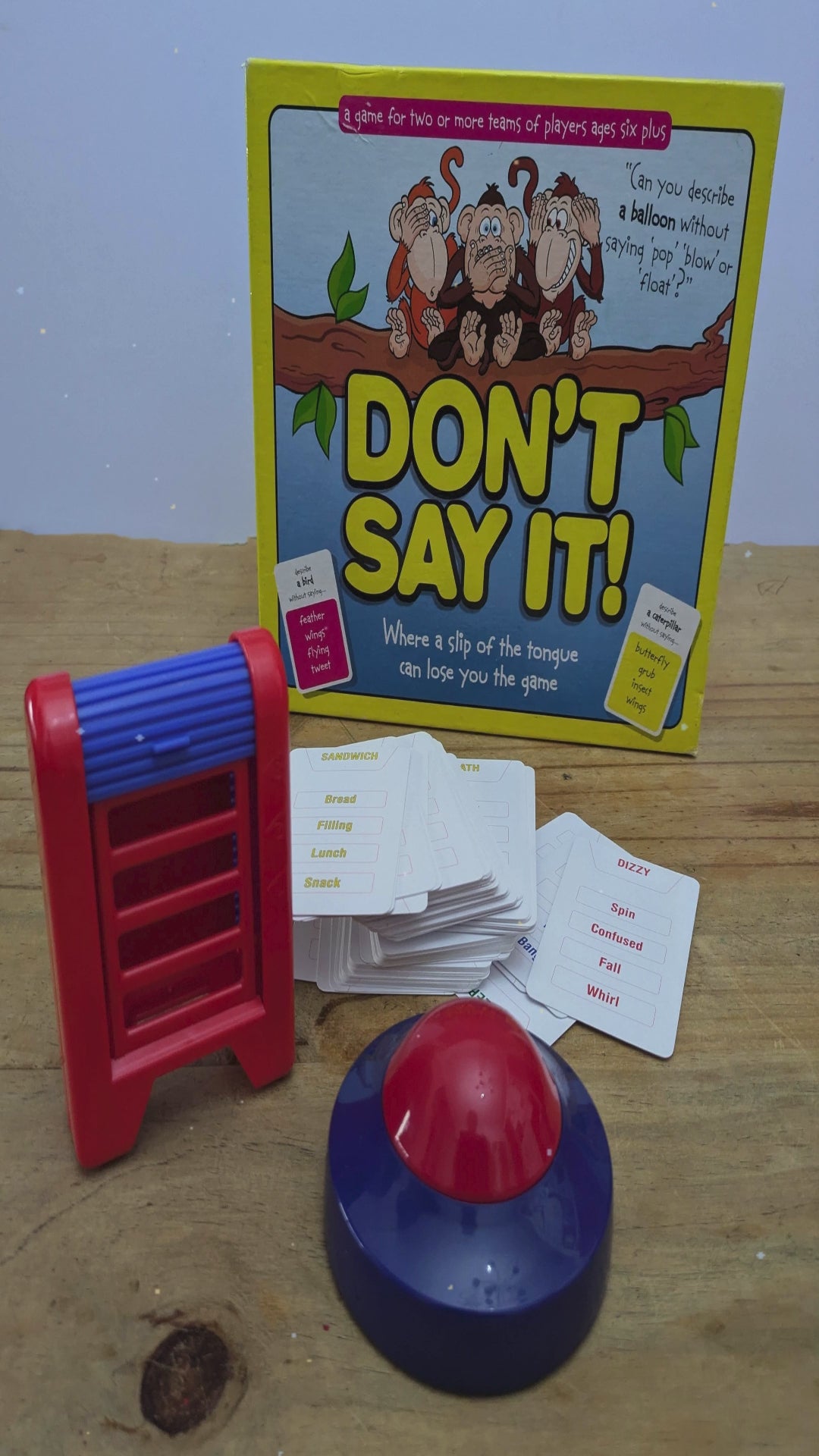 Don’t Say It (2008) game box featuring colourful graphics, word cards, and the game logo emphasizing fun word challenges.